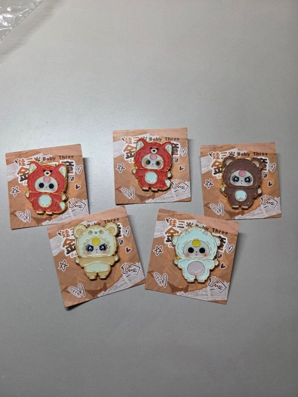 Baby three metal pin badges - set of 5